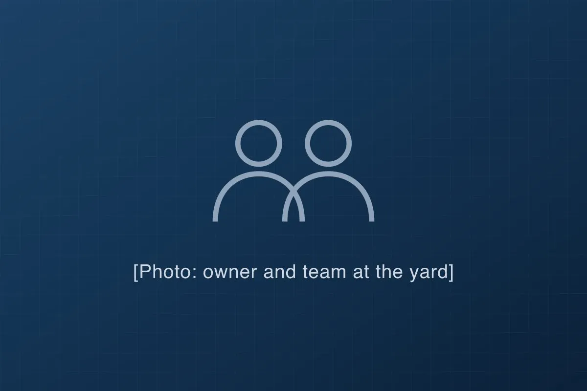 [Photo description: owner and team at the yard]